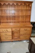 A 19th Century style stripped pine dresser