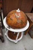 A vintage globe cocktail cabinet