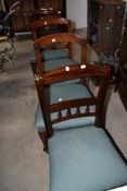 Two pairs of 19th Century mahogany dining chairs, all with same later upholstery