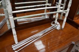 A Victorian pained towel rail and an interesting 1930s aluminium drying or airing rack