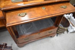 A nice quality reproduction yew wood TV cabinet having faux drawer fronts