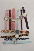 Ten bright coloured ladies fashion watches.