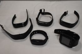 6 smart watches including Fitbits etc.