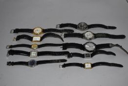 10 wrist watches all in black tones.