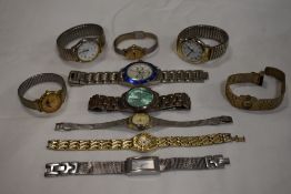 10 wrist watches in silver and gold tones