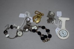 6 wrist watches all in various colours.