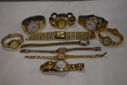 10 wrist watches all in gold tones.