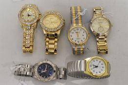 Five mens watches with gem or silver accents.
