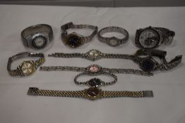 10 wrist watches all in silver tones.