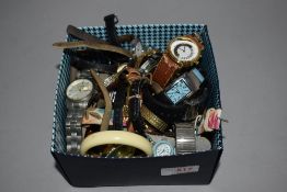 A box of assorted fashion watches various styles and designs.