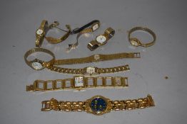 10 gold tone watches including Pierre Mercier and 2 Pulsar.