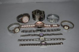 10 wrist watches all in silver tones.