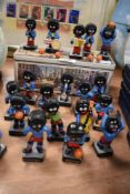 A collection of early 20th century Robertson Jam advertising figures