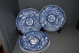 Five modern Chinese porcelain dinner plates in traditional blue and white pattern