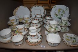 Three early 20th century tea services including Standard China Pagoda, Melba Ware and Bone China