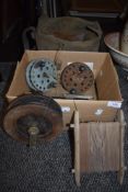 A canvas bag and a box of vintage fishing tackle and reels.