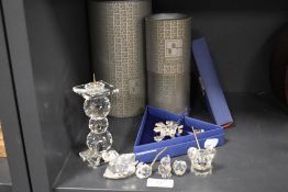 A selection of modern Swarovski silver crystal glass ornaments including candlestick, mice and