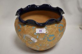 An early 20th century Royal Doulton Jardiniere planter having turquoise gilt and cobalt decoration