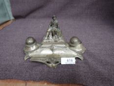 A WW2 period Inkwell, Silver Plated Solider seated with Two Helmets Camp De Mourmelon, military camp