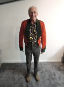 An early 20th century Dorsetshire Regimental Officers Dress Jacket having 2 crown pips to