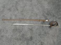 An Italian Cavalry Officers Dress Sword, open steel basket guard, wooden grip, etched blade, blade