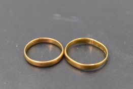 Two small 22ct gold wedding bands, sizes H & L and approx 3.3g