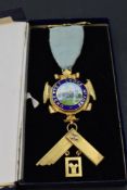A cased silver gilt Masonic jewel regarding Underley Lodge no: 1074, dated 1955