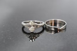 A diamond solitiare dress ring having a marquise cut diamond, approx 0.85ct in a claw set mount to
