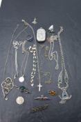 A selection of white metal and HM silver jewellery including necklaces, pendants, brooches, charm