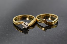 A diamond solitaire ring, approx 0.45ct in a six claw set mount to cross over shoulders on an 18ct