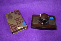 An antique maritime souvenir ink blotter made from HMS Britannia timber, along with a Post office