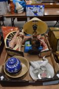 A wooden lamp, two oriental dolls on stands, ginger jar and more.