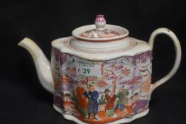 A Lowestoft porcelain teapot in commode shape with Chinoiserie pattern having had professional