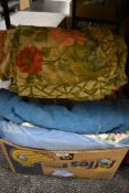 A selection of vintage throws, cushions and soft furnishings