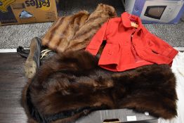 A selection of vintage textiles including childs red jacket, fur collars and night dress