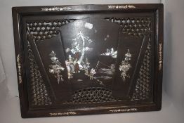 An early 20th century Chinese tray with honey comb lattice work and mother of pearl inlayed design