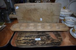 Two artisan kitchen bread boards and a beech wood egg holder.