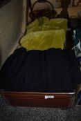 A selection of fancy dress costumes in leather case