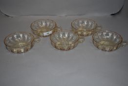 A set of five Art Deco era Daum Nancy peach crystal glass cocktail or punch glasses.