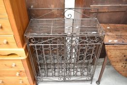 A metal work 49 bottle wine rack