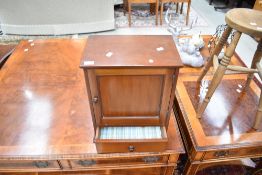 An Edwardian mahogany bathroom or similar cabinet