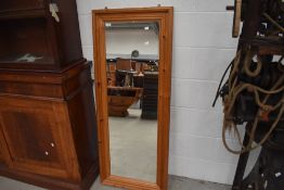 A modern pine full length wall mirror