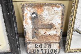 A vintage road junction sign