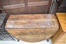 A 19th Century oak gateleg dining table