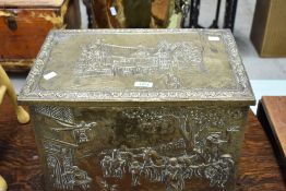 A brass slipper/kindling box