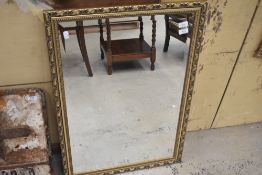 A modern gilt framed mirror
