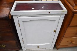 A painted side cabinet