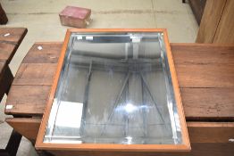 A vintage bleached mahogany frame wall mirror