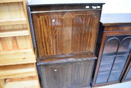A reproduction Regency style mahogany bureau/cocktail cabinet