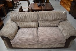 A modern settee in brown tones